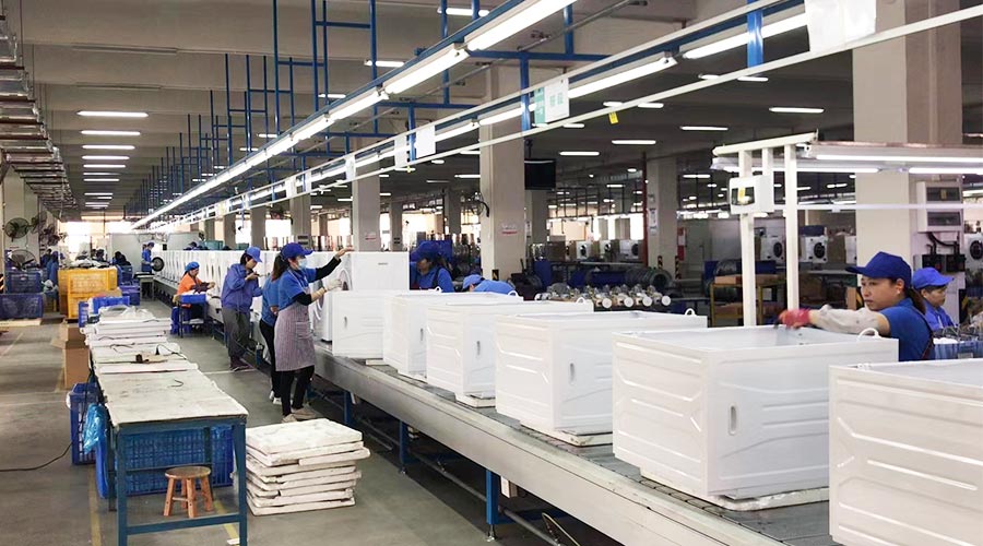 專業且專注！裝配車間開展客戶松下滾筒衣服烘干機生產